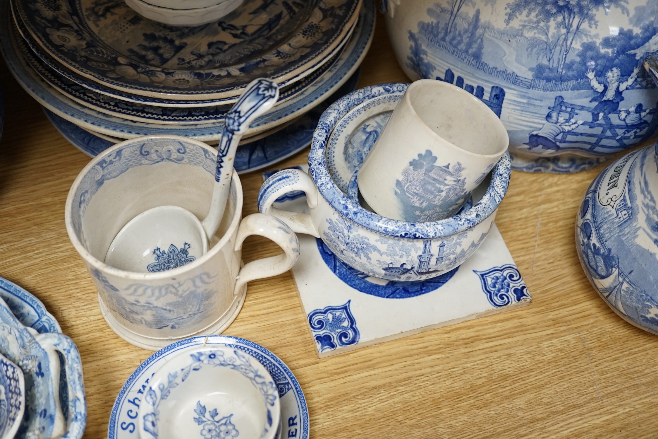 A collection of mixed blue and white dinnerware including Masons Ironstone, mostly plates and jugs. Condition - varies, poor to fair